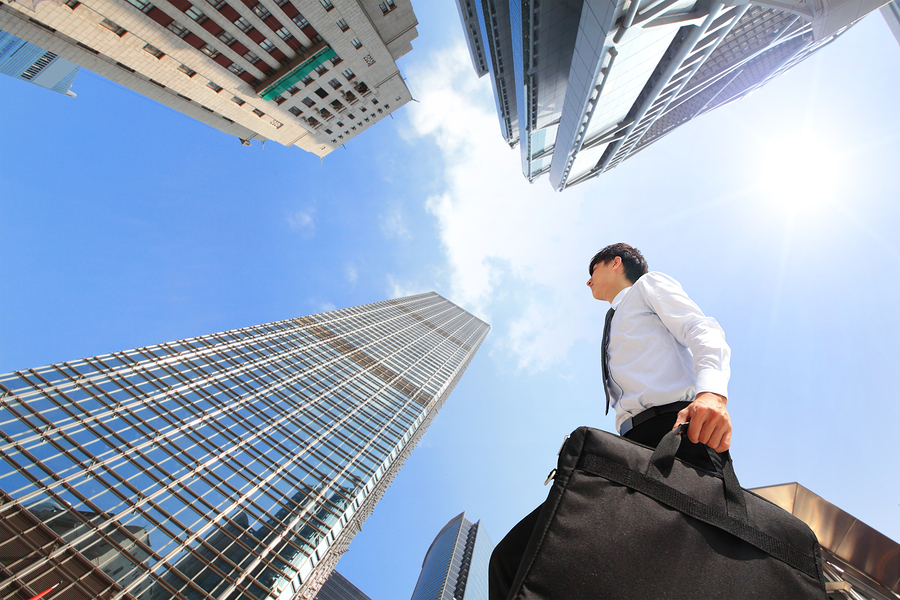 Successful Business Man Outdoors Next To Office Building